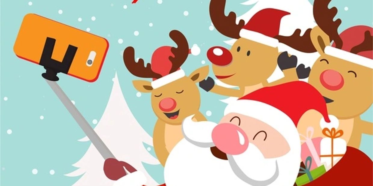 Santa and reindeer taking a selfie with gifts.