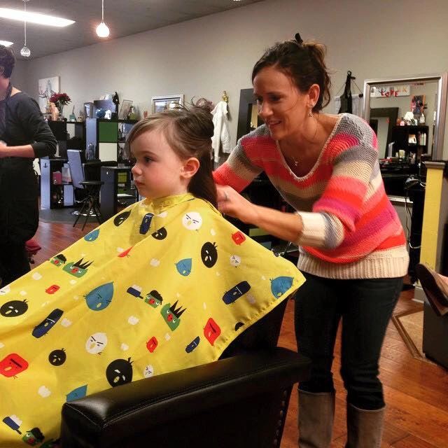 Veronica Carroll cutting hair at Foiled Rotten Salon in Jacksonville, FL. 