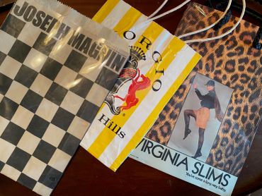 Vintage shopping bags and ephemera at a Mercanti estate sale in Vacaville, California