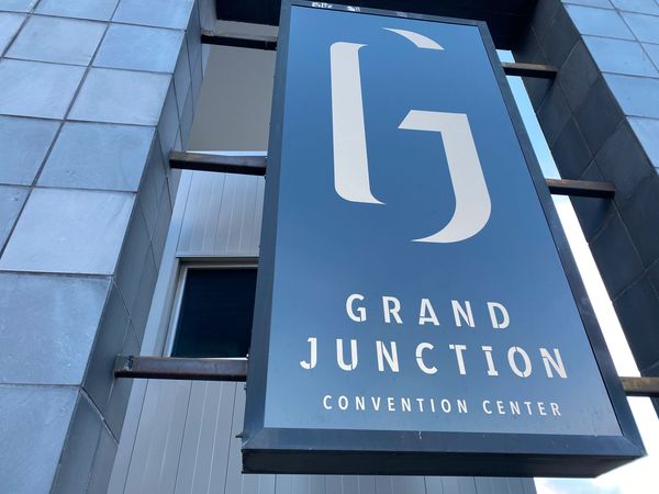 Sign for Grand Junction Convention Center on a building.