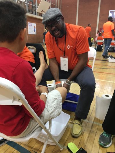 Wally supporting Samaritans Feet at a shoe distribution event in Los Angeles.