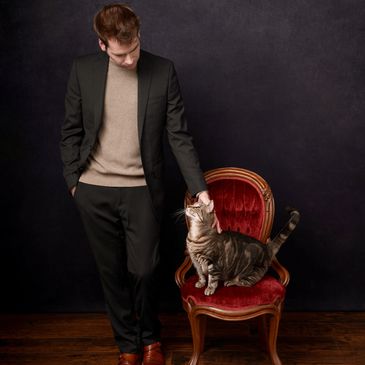 cat looking at man, owner of Prestige Pets pet care, dog walking, cat care, overnight pet sitting