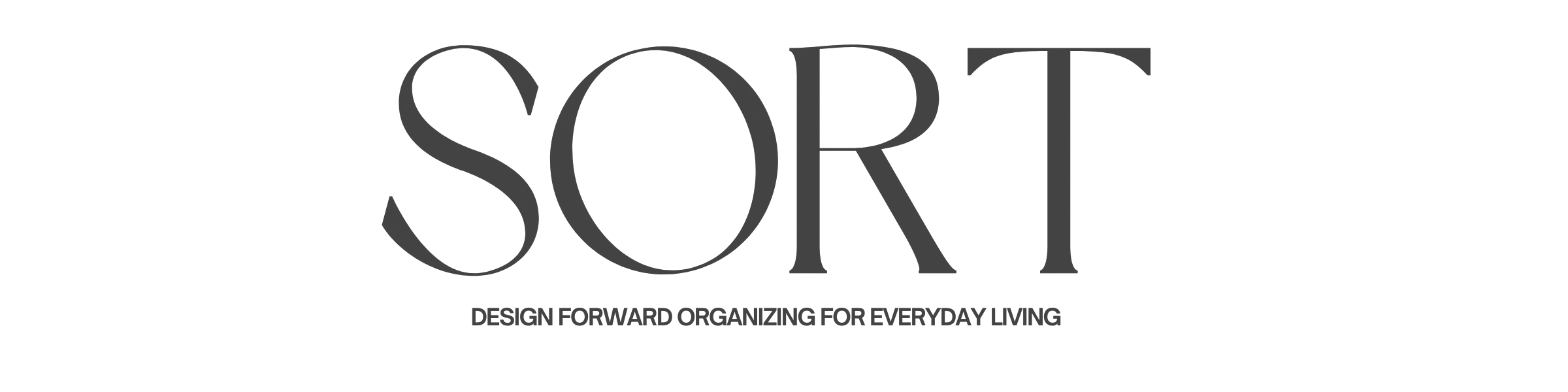 Stack of books next to pencils in a holder and a camera.