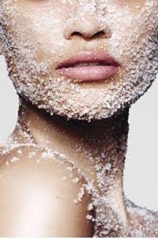 Close-up of a face covered in coarse salt crystals.