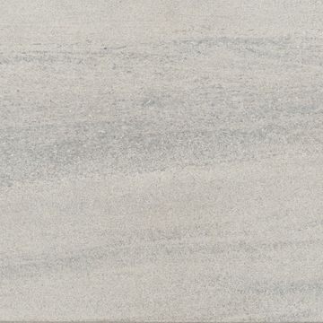 Close-up of a light gray textured stone surface.
