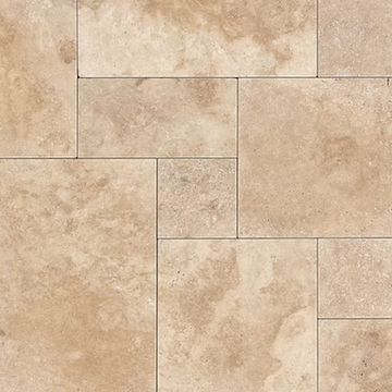 Beige stone tiles arranged in a staggered pattern.