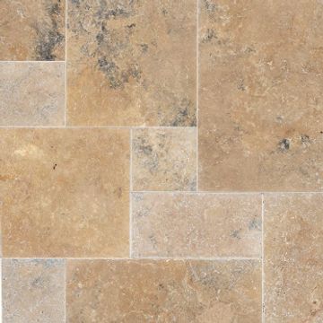 Patterned beige and light brown tile floor with natural stone texture.