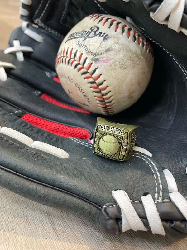 Baseball glove, ball, and championship ring
