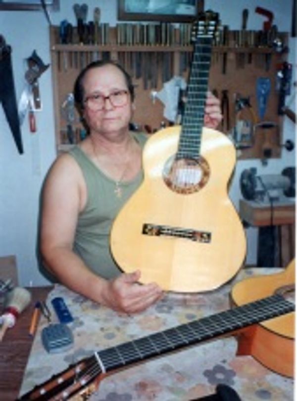 A person holding a guitar