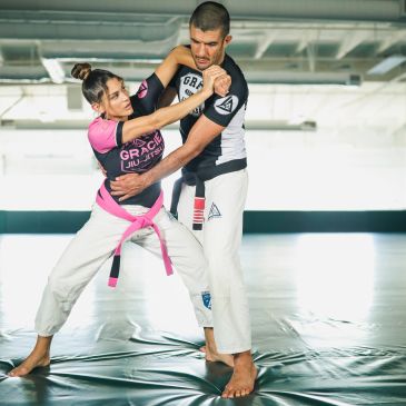 Eve Gracie practising women empowered Gracie Jiu Jitsu with Rener Gracie 