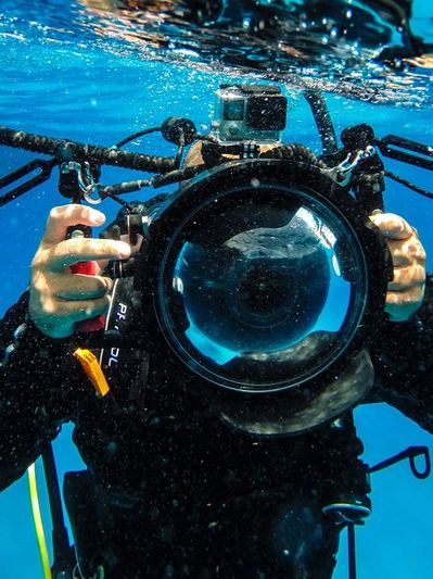 A Diver With Diving Gear In Water