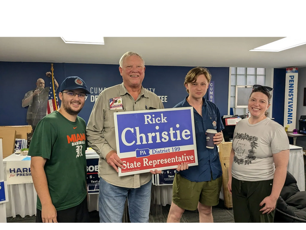 Rick with young supporters in 2024.