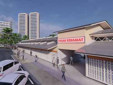 A street scene with people walking near Pasar Keramat market and vehicles on the road under a clear sky.