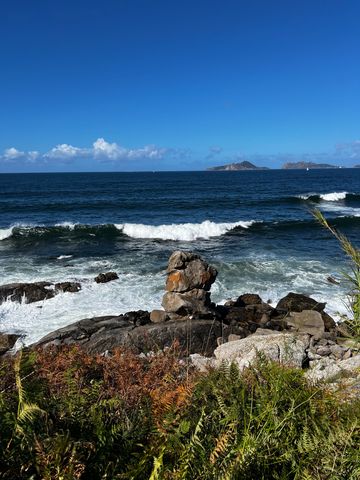 Camino de Santiago on the coast, waves and rocks. 
