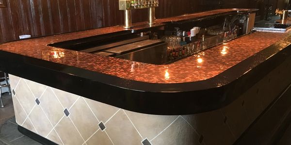 Epoxy coated bar top with Pennies.