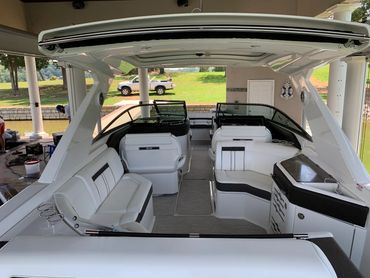 Professional glass cleaning and odor neutralizing on cabin cruiser
