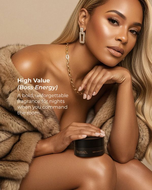 Elegant woman showcasing a luxury fragrance with bold, confident energy.