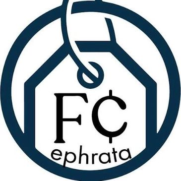Logo with house, hook, and text Ephrata FC.