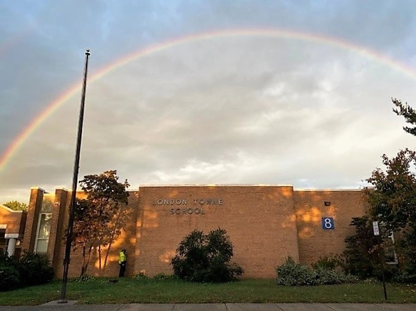 London Towne Elementary School Building with a rainbow