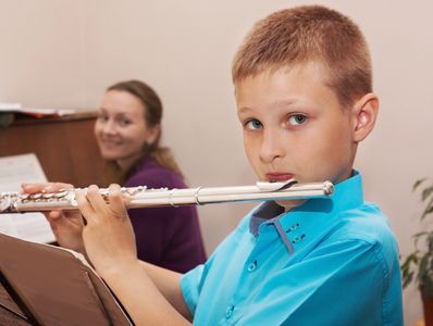 boy playing flute