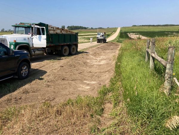 Ditching Equipment onsite a local township project to eliminate a secondary ditch and roadway damage