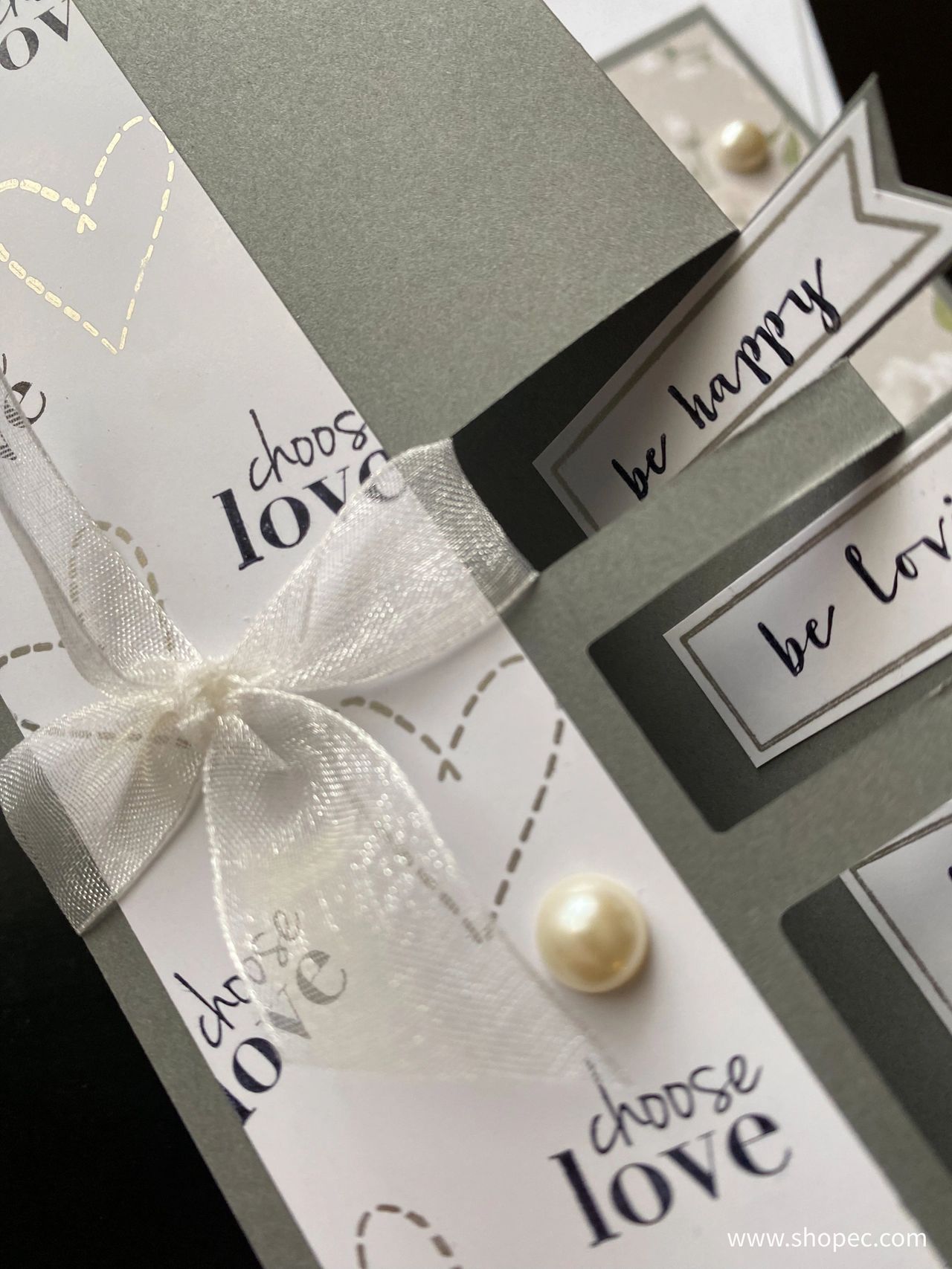 Triple flag card - close up of front. Words say “choose love”, “be happy” and “be loving”.