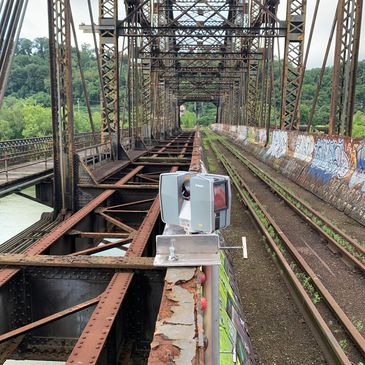 3D laser scanning of a complex bridge for structural modeling by engineers.