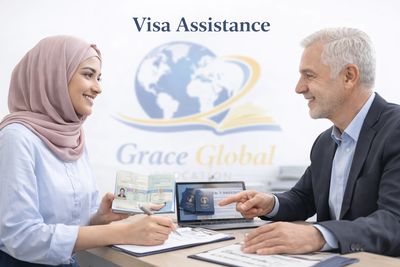 A woman receives visa assistance from a professional at Grace Global.