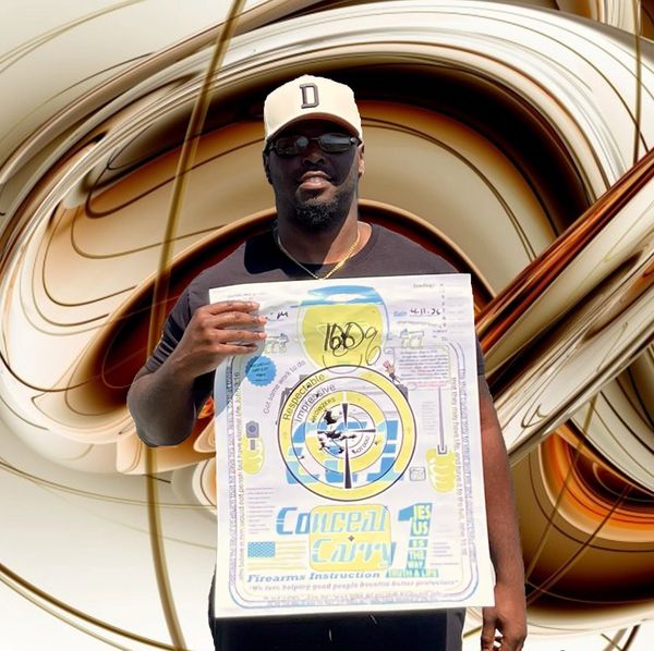 Man holding a shooting target with multiple bullet holes and a high score.