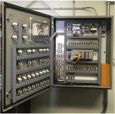 Open electrical control panel with wiring and components.