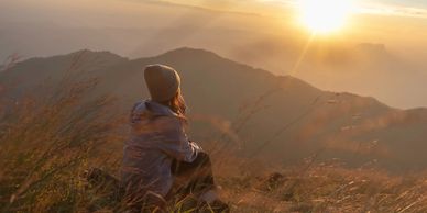 Woman staring at mountain view