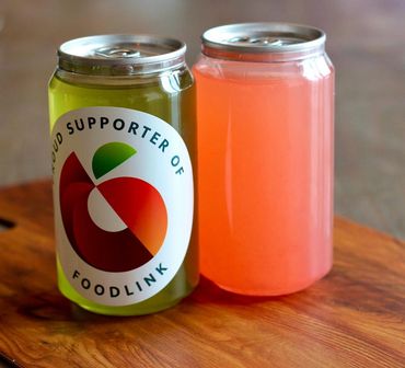 our Party Pop Cans in custom branded stickers for guests at a fundraiser