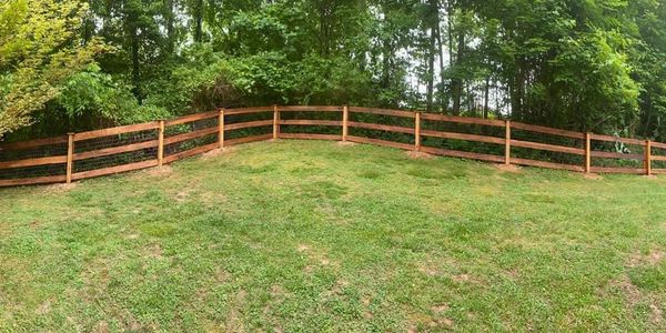 Mountain Ranch rail with black wire mesh.