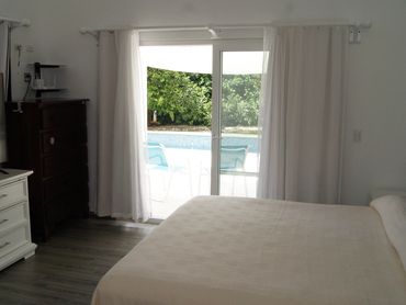 Master bedroom with pool entrance