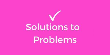 A graphic which says "Solutions to Problems" with a white tick on pink background