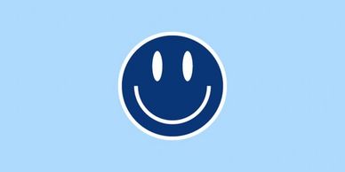A graphic with a dark blue and white smiley face on a light blue background