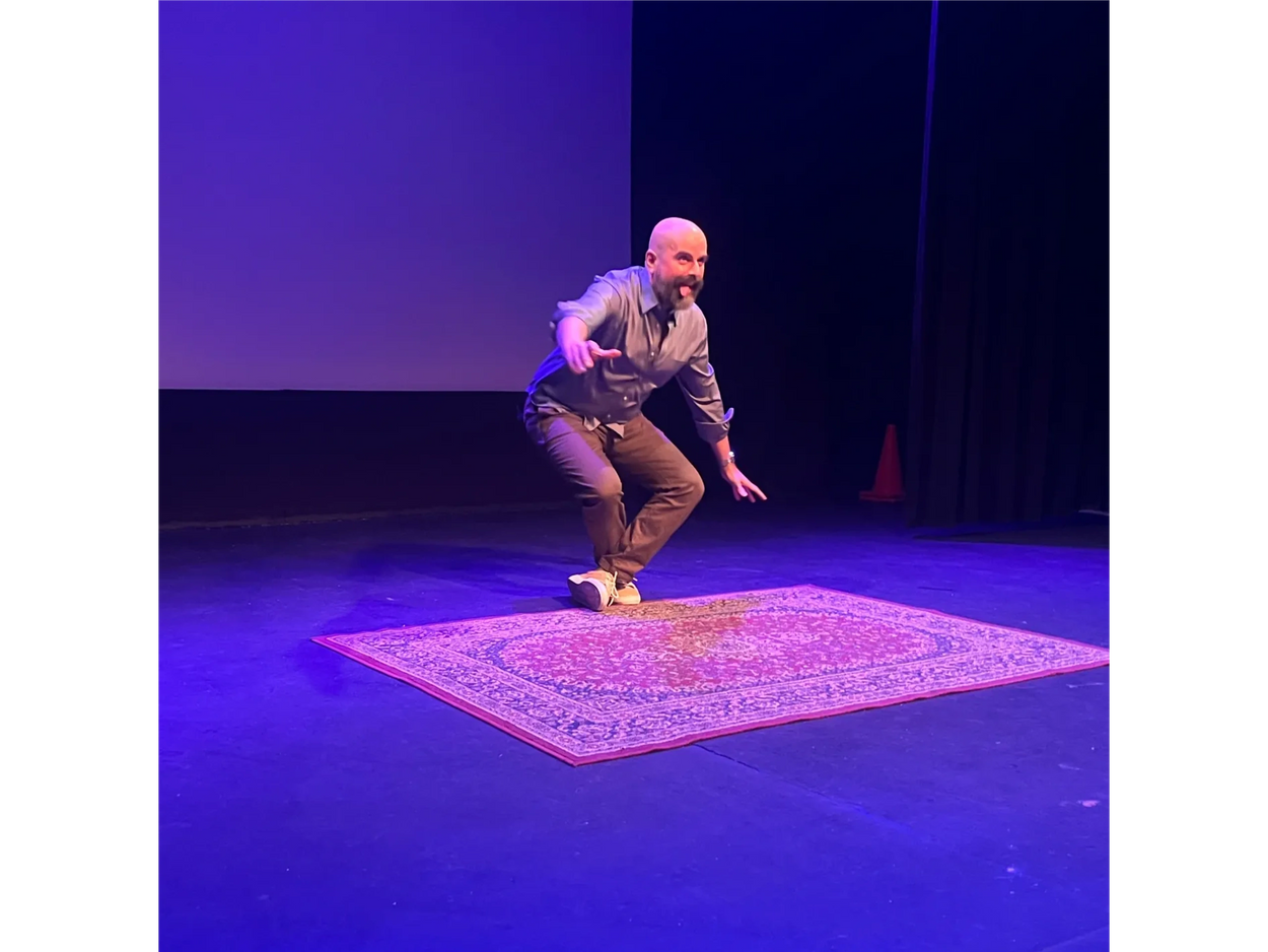 Haig "Hike" Chahinian crouches down during world premiere of Best. Dad. NEVER.