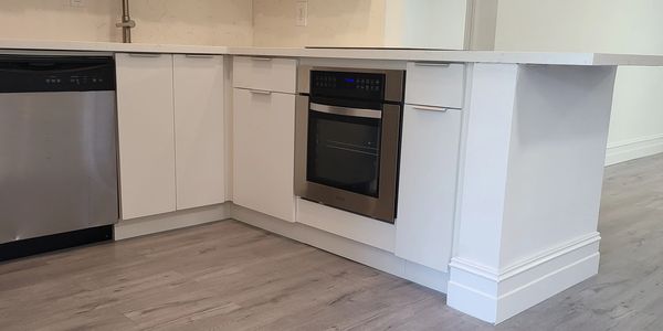 Gorgeous open concept kitchen with brand new appliances.