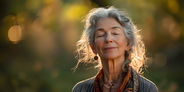 an old woman with smile on face & feeling peace