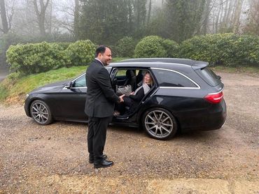 DE Chauffeurs Mercedes Benz E Class with Client on route to London Heathrow Terminal 3