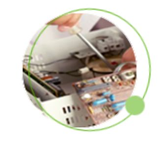 Hand repairing electronic circuit board with a screwdriver.