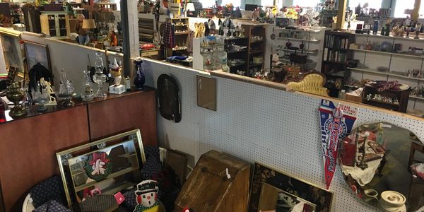 Aisles full of a variety of antique items.