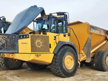 Yellow Deere construction truck with open hood.
