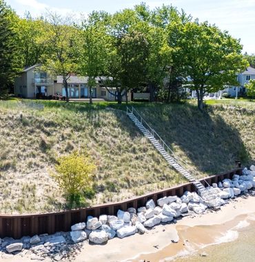 Over Seawall and Rocks