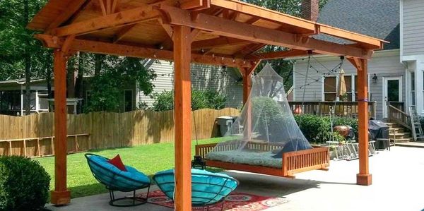 Warm cedar color and a solid roof make this a perfect gazebo for Colorado