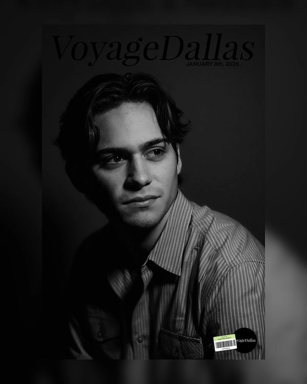 Black and white portrait of a young man in a striped shirt on VoyageDallas cover.