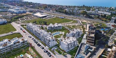 Aerial view of a residential area near the coast.