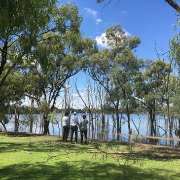 kulkyne hattah national park with river in background with men standing in amongst trees