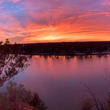 river bend with sunset and trees 