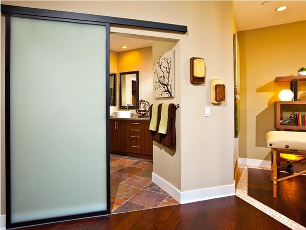 Barn Door used to create privacy between master bedroom and master bathroom.